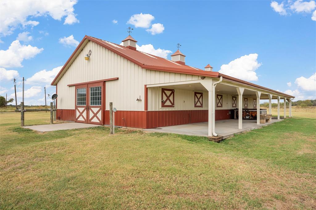 282 County Road 255 Reagan, TX 76680 - Photo 19 of 28 a view of a house with a yard and sitting area