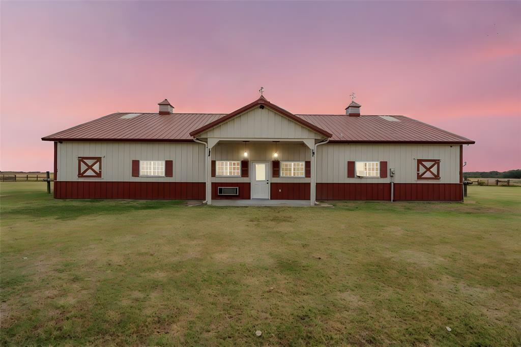 282 County Road 255 Reagan, TX 76680 - Photo 6 of 28 a front view of a house with garden