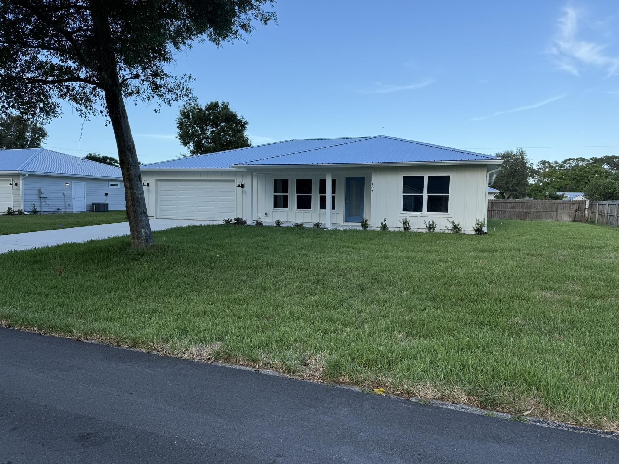 a house view with a garden space