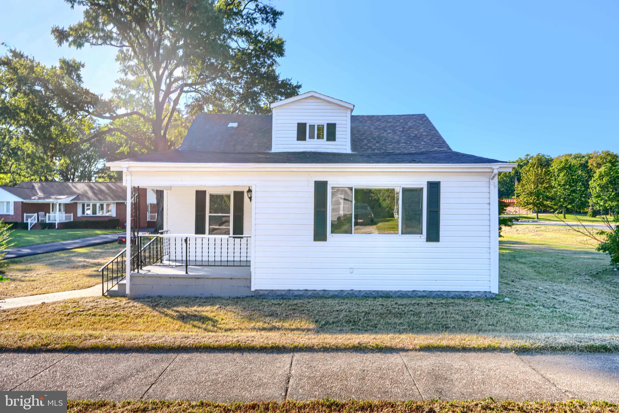 212 North Marlyn Avenue Essex, MD 21221 - Photo 2 of 54 a front view of a house with garden