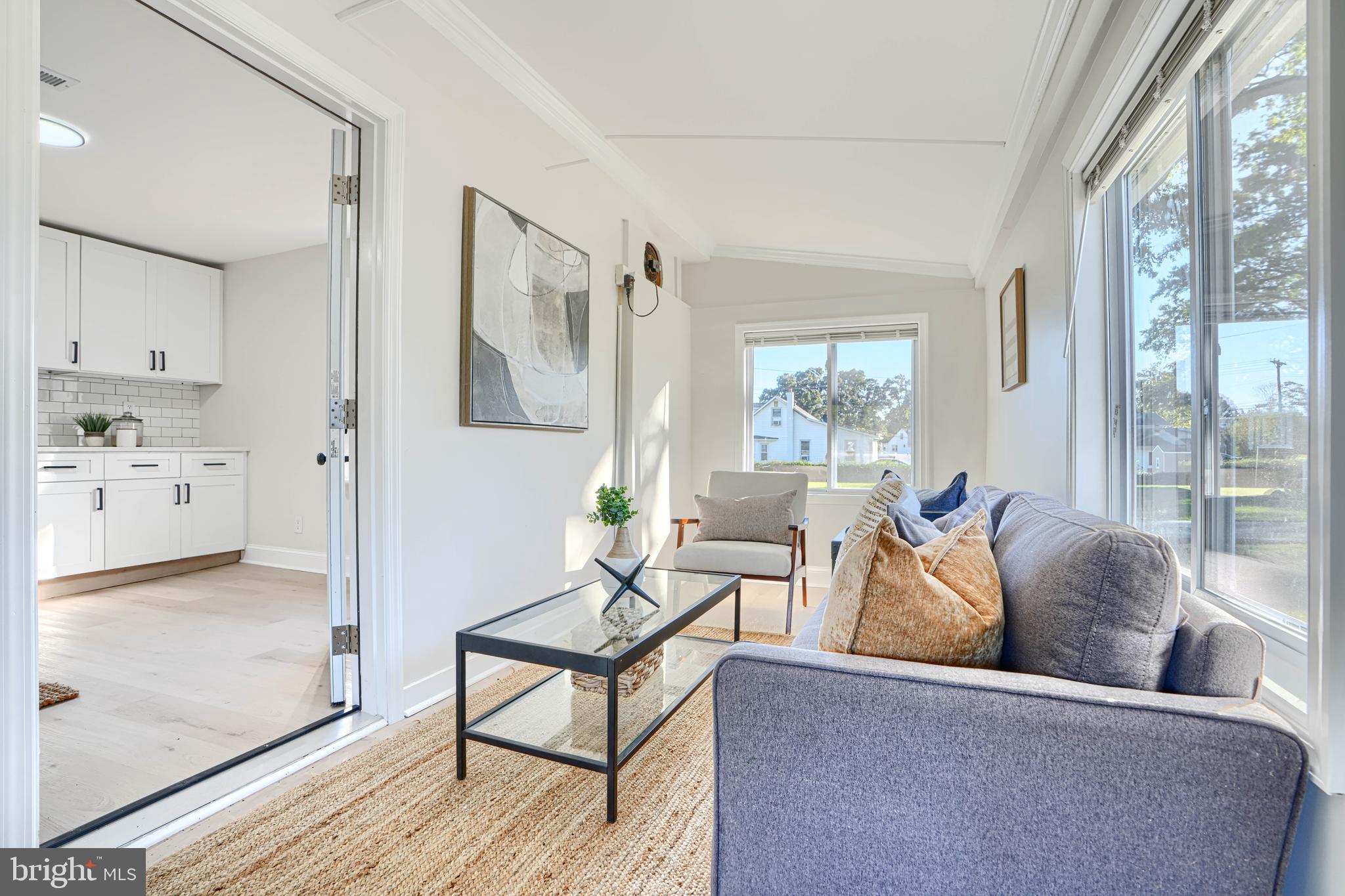 212 North Marlyn Avenue Essex, MD 21221 - Photo 22 of 54 a living room with furniture and a window