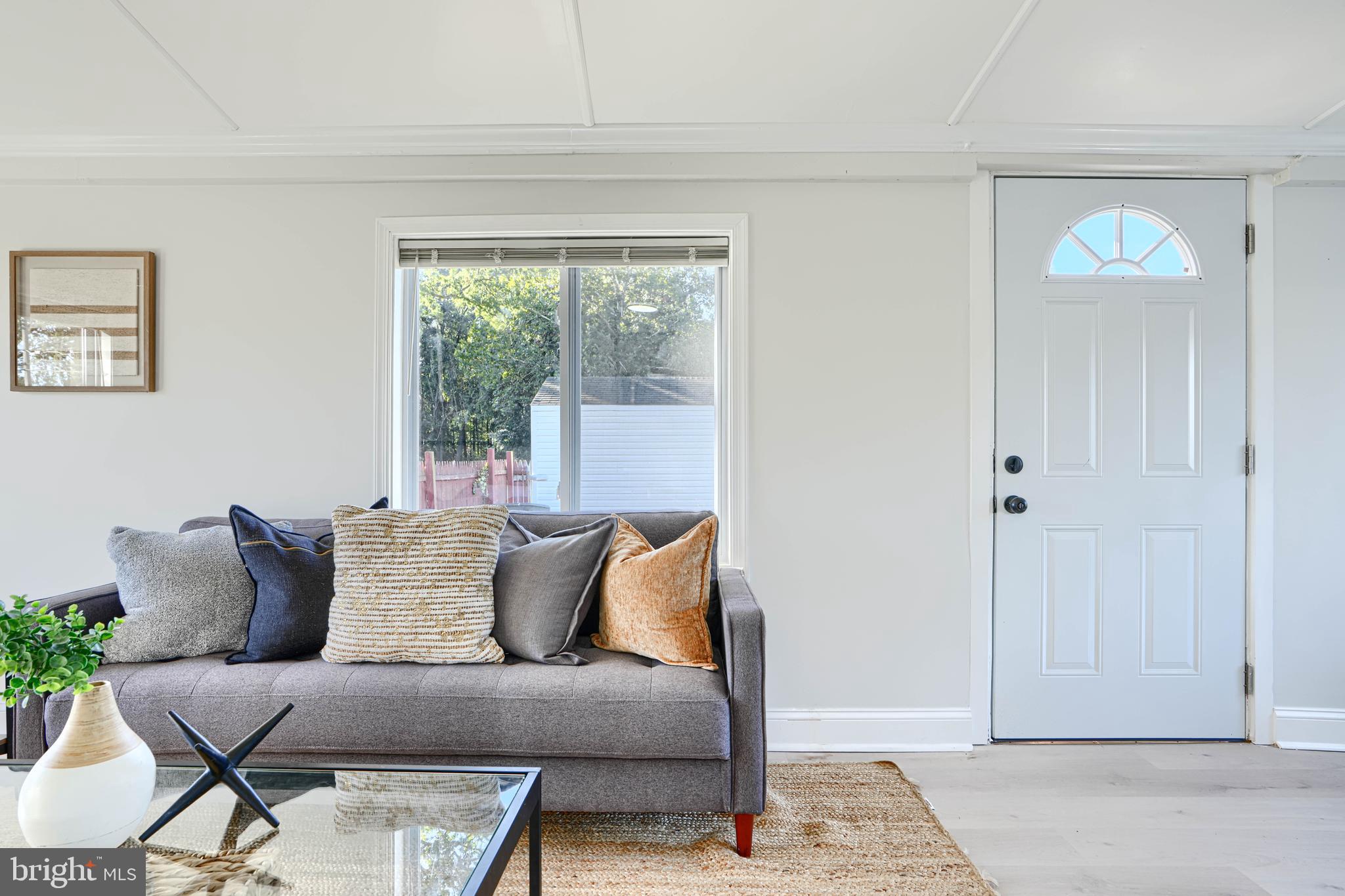 212 North Marlyn Avenue Essex, MD 21221 - Photo 23 of 54 a living room with furniture and a window