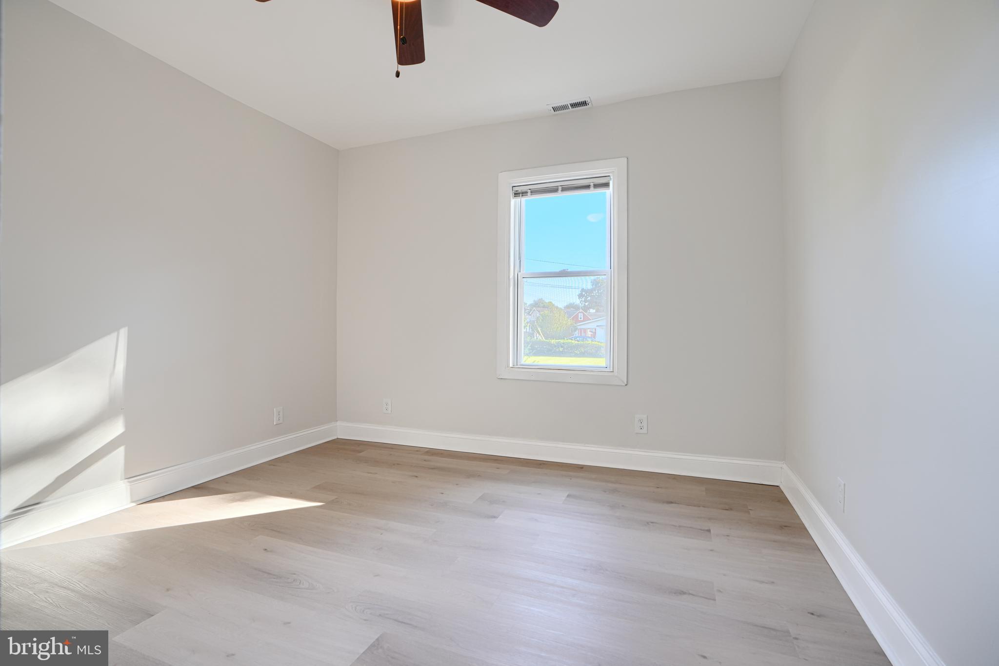 212 North Marlyn Avenue Essex, MD 21221 - Photo 26 of 54 an empty room with windows