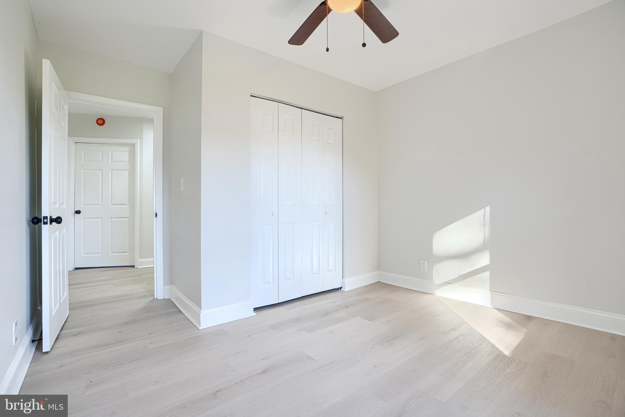 212 North Marlyn Avenue Essex, MD 21221 - Photo 27 of 54 an empty room with closet and fan