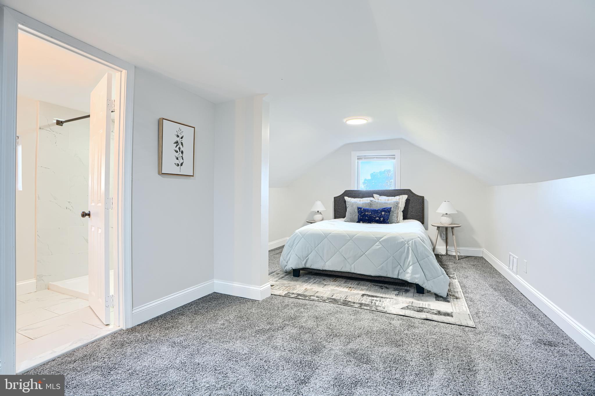 212 North Marlyn Avenue Essex, MD 21221 - Photo 41 of 54 a bedroom with a bed and wooden floor