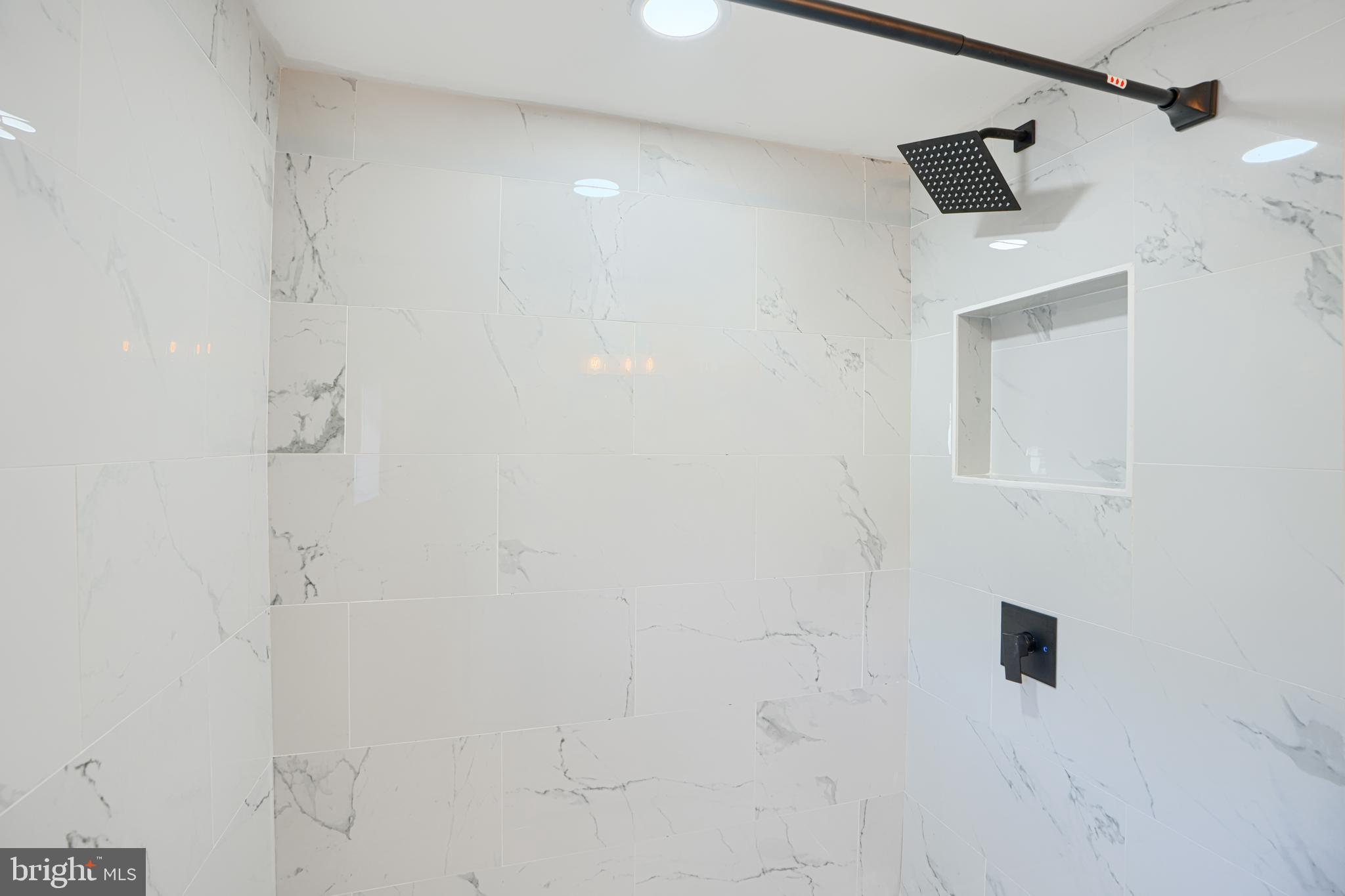 212 North Marlyn Avenue Essex, MD 21221 - Photo 47 of 54 a bathroom with a shower