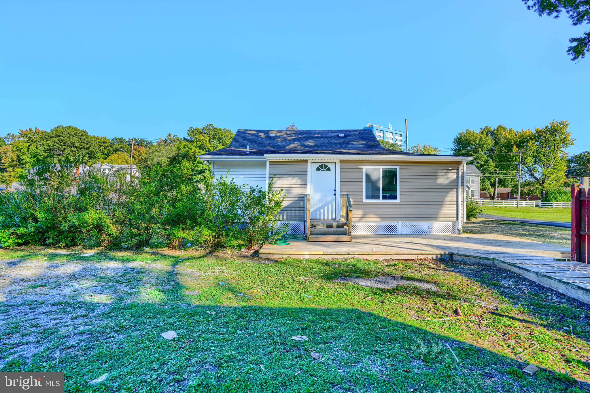 212 North Marlyn Avenue Essex, MD 21221 - Photo 51 of 54 a view of a house with backyard and sitting area
