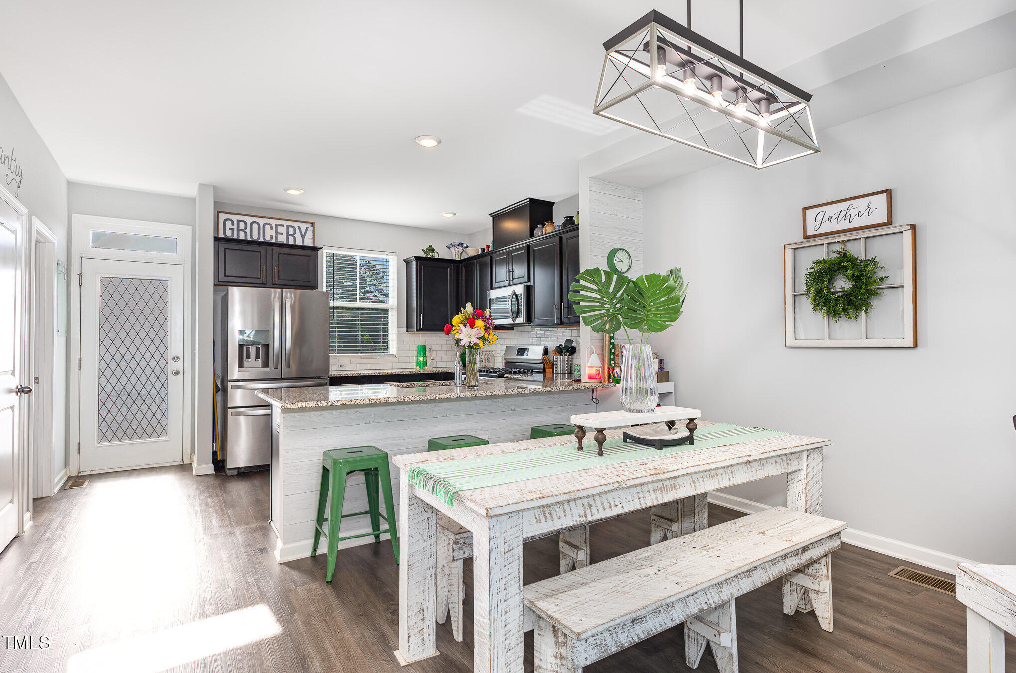 217 Jones Hill Road Holly Springs, NC 27540 - Photo 9 of 39 a view of kitchen with sink microwave and refrigerator
