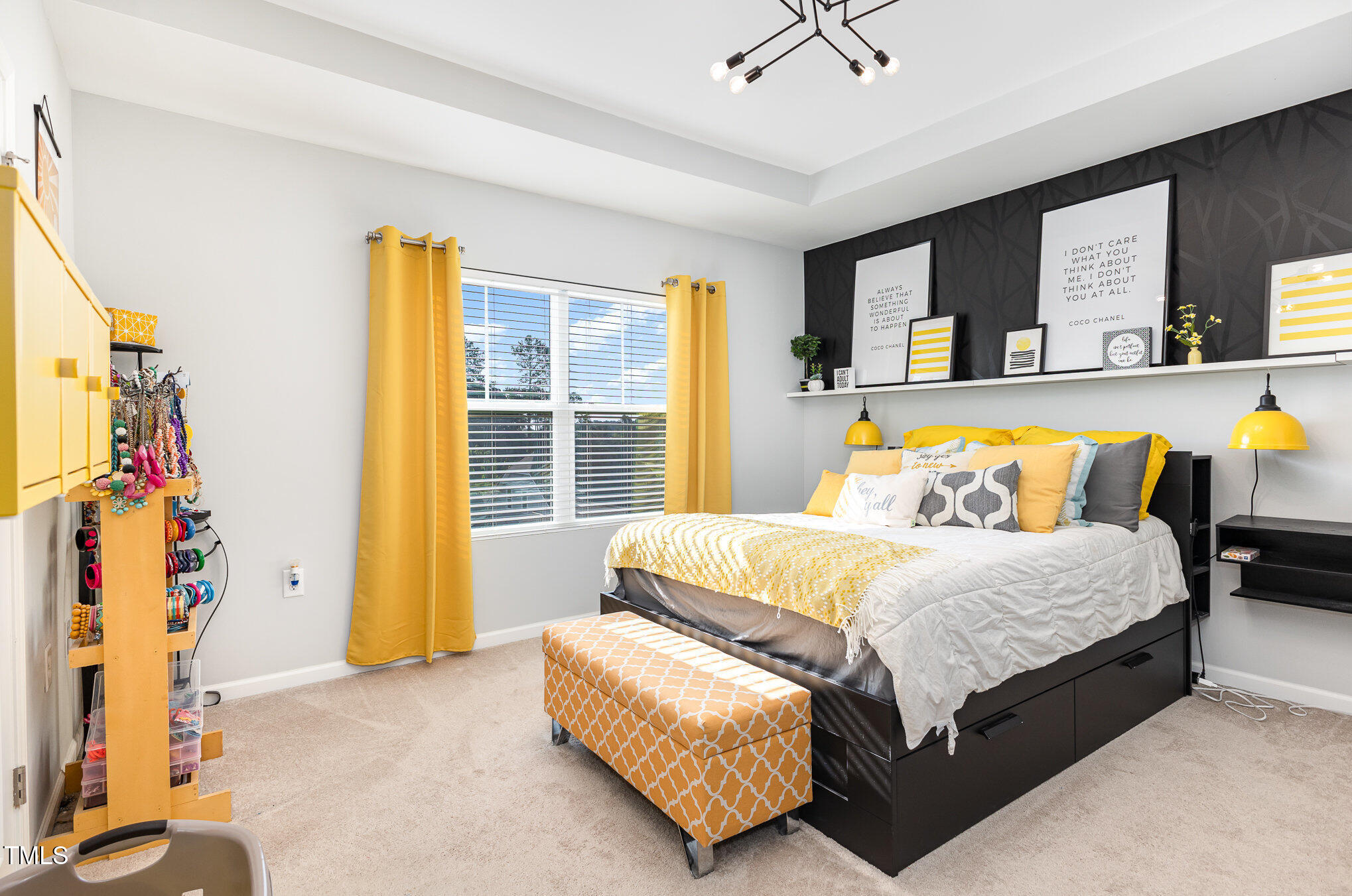 217 Jones Hill Road Holly Springs, NC 27540 - Photo 15 of 39 a bedroom with a bed and a table