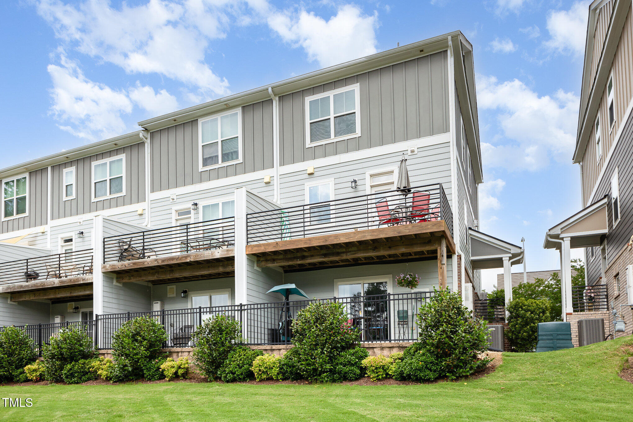 217 Jones Hill Road Holly Springs, NC 27540 - Photo 30 of 39 a view of a house with garden and plants