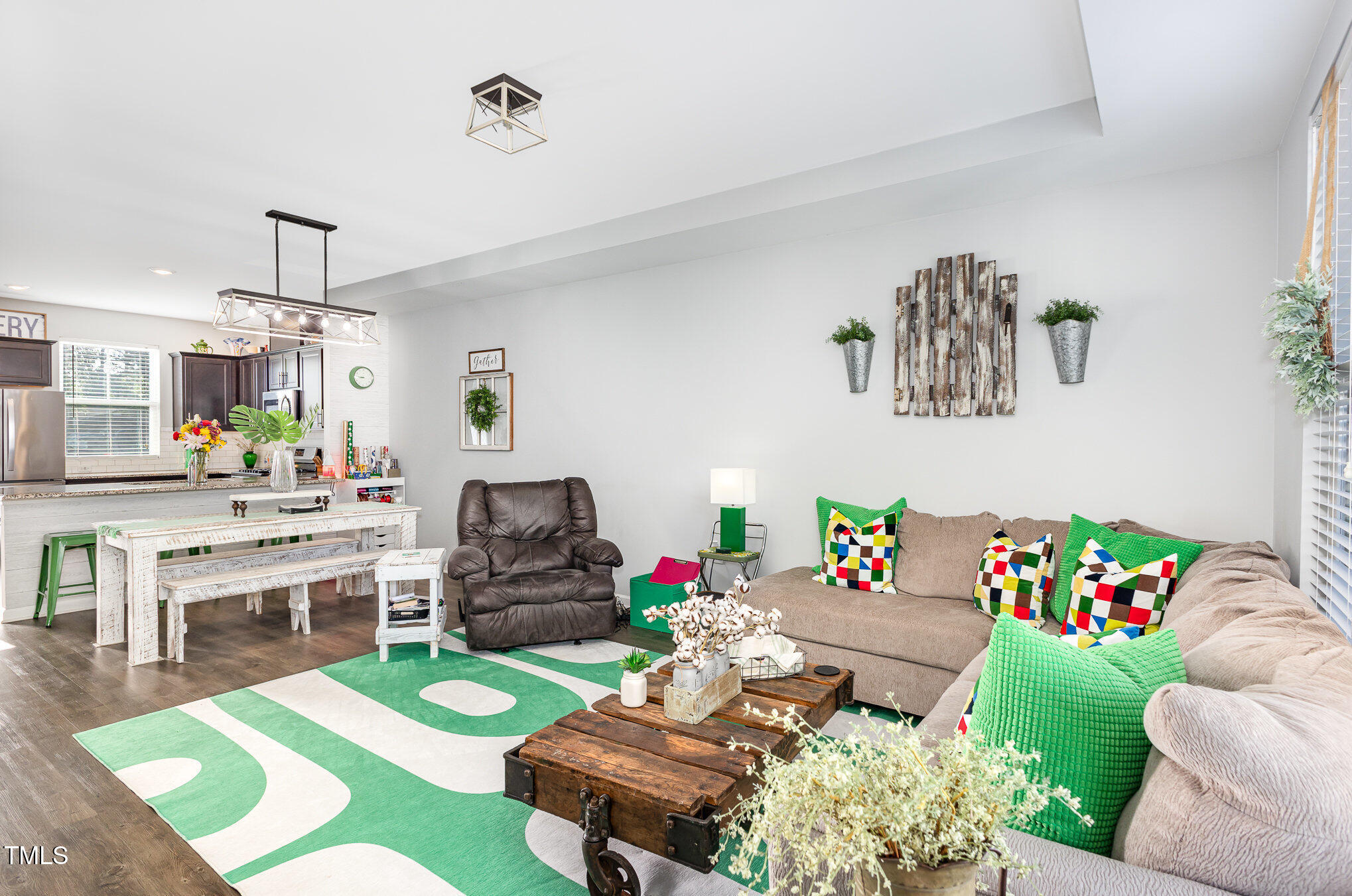 217 Jones Hill Road Holly Springs, NC 27540 - Photo 5 of 39 a living room with furniture and wooden floor