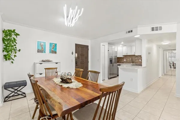 a view of swimming pool with outdoor seating