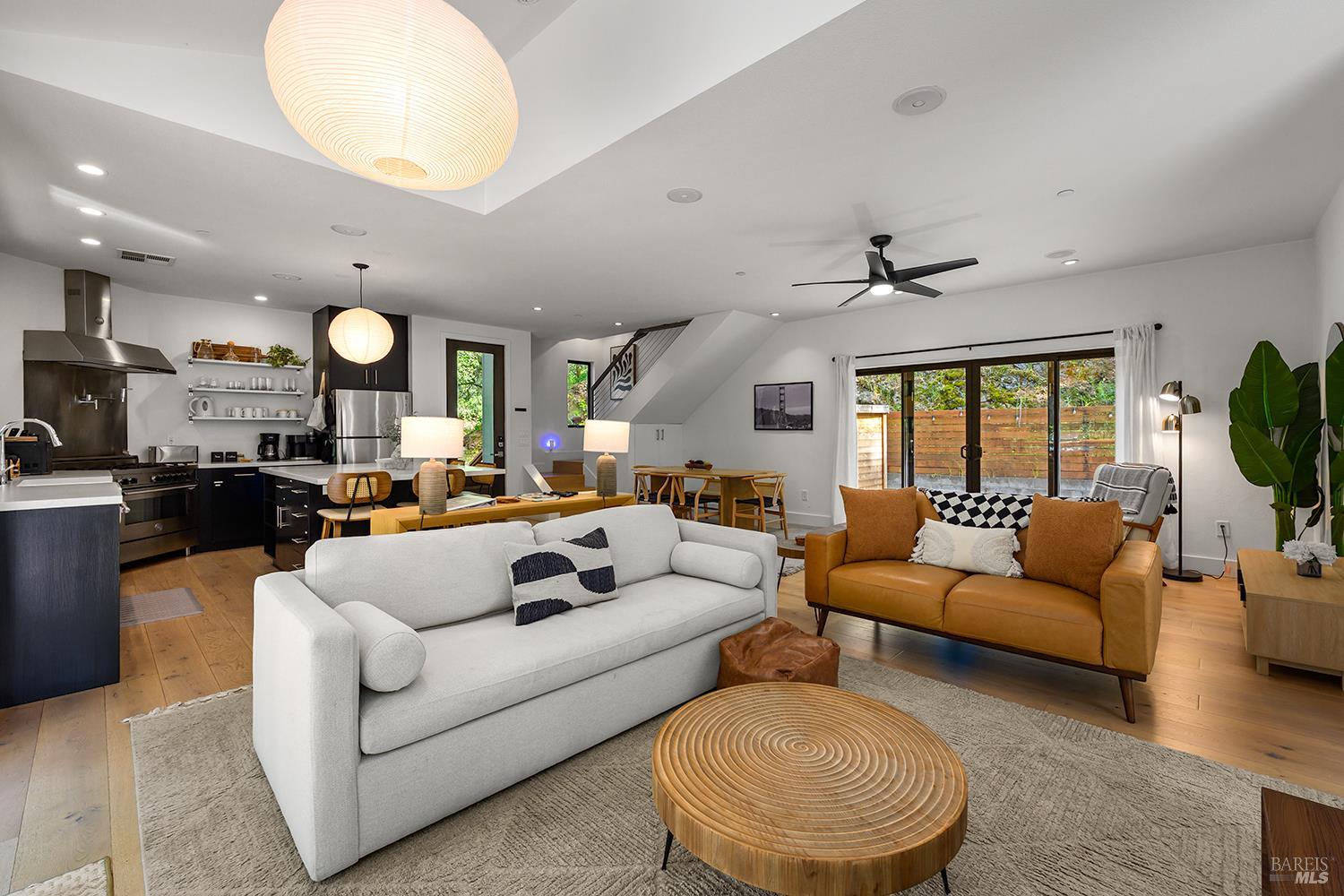 2563 Mill Creek Road Healdsburg, CA 95448 - Photo 14 of 42 a living room with furniture and a large window