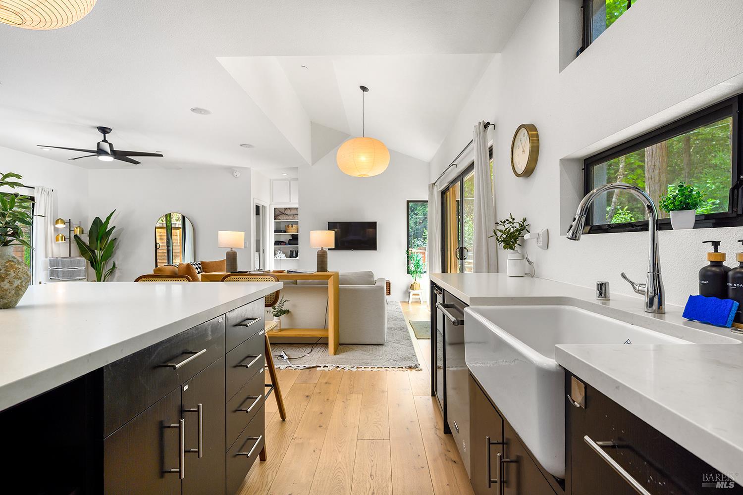 2563 Mill Creek Road Healdsburg, CA 95448 - Photo 16 of 42 a kitchen with a sink appliances and a large window