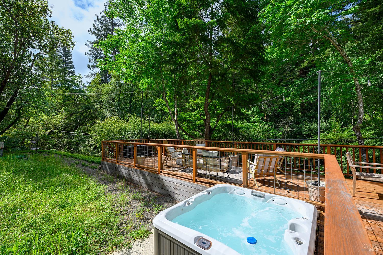 2563 Mill Creek Road Healdsburg, CA 95448 - Photo 26 of 42 a view of a swimming pool with a patio