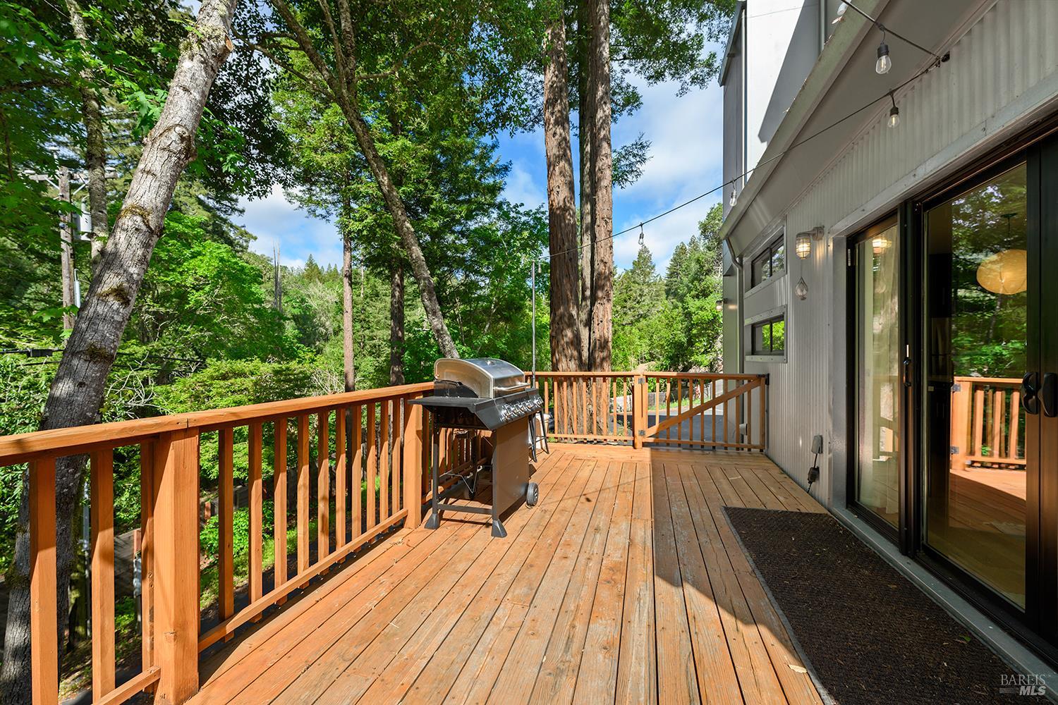 2563 Mill Creek Road Healdsburg, CA 95448 - Photo 32 of 42 a view of balcony with wooden floor and fence