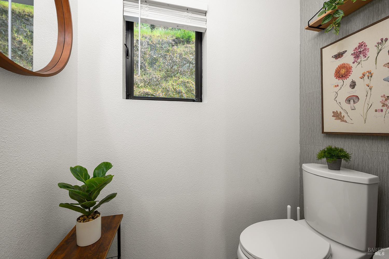 2563 Mill Creek Road Healdsburg, CA 95448 - Photo 38 of 42 a bathroom with a toilet and a sink
