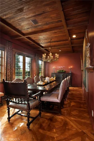 a view of a bedroom with closet and a large window