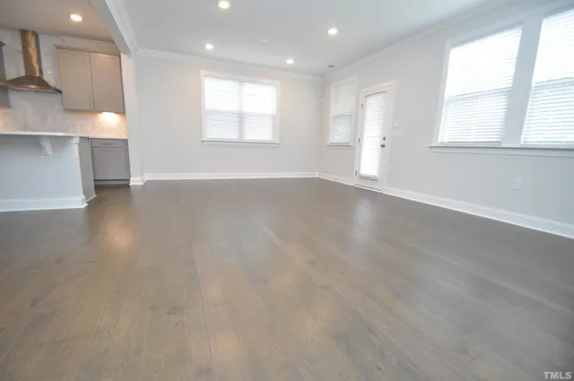 a view of a kitchen with a sink and microwave