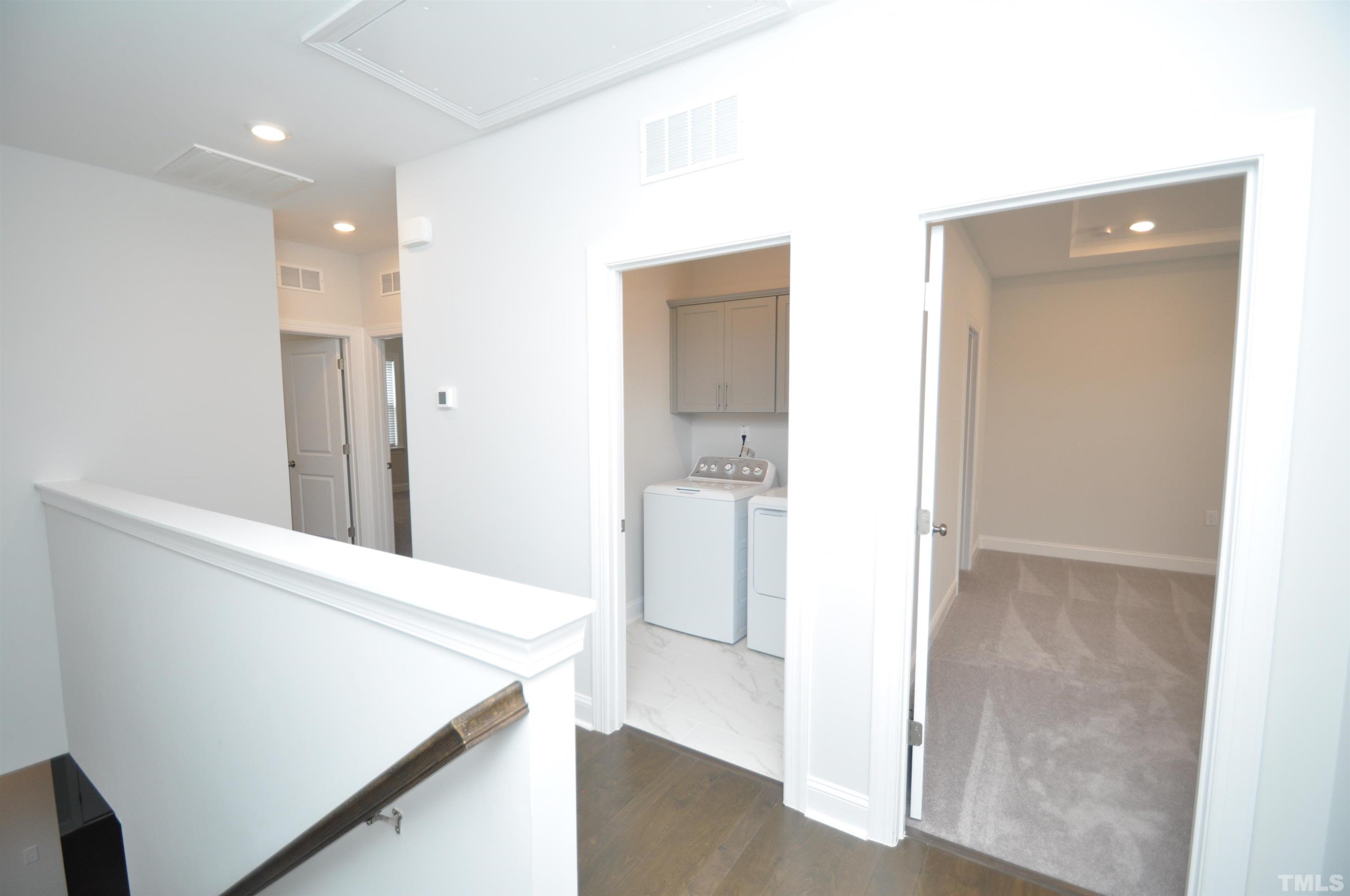 2949 Rise And Shine Road Apex, NC 27523 - Photo 16 of 49 a view of hallway with wooden floor