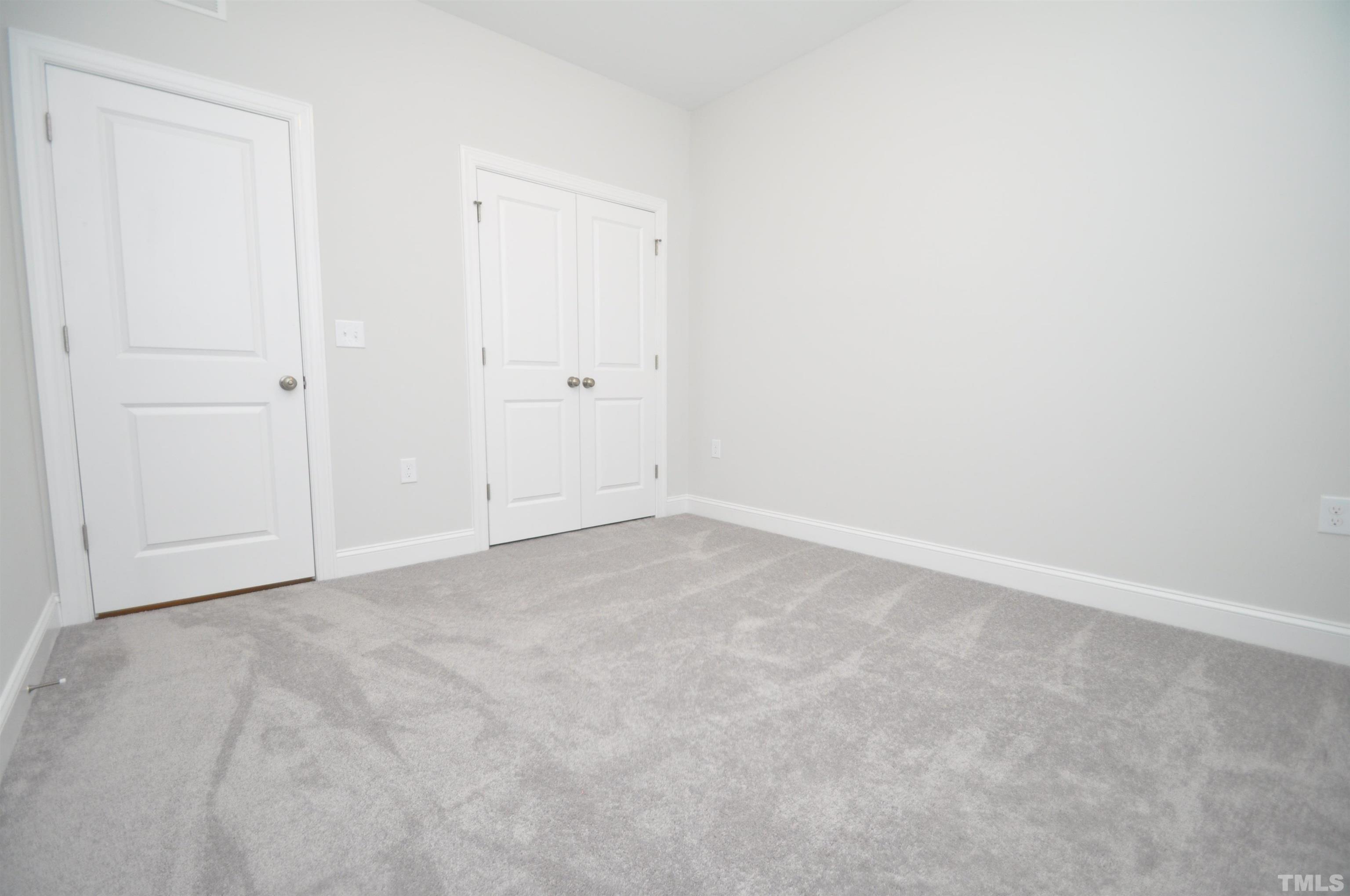 2949 Rise And Shine Road Apex, NC 27523 - Photo 18 of 49 a view of an empty room