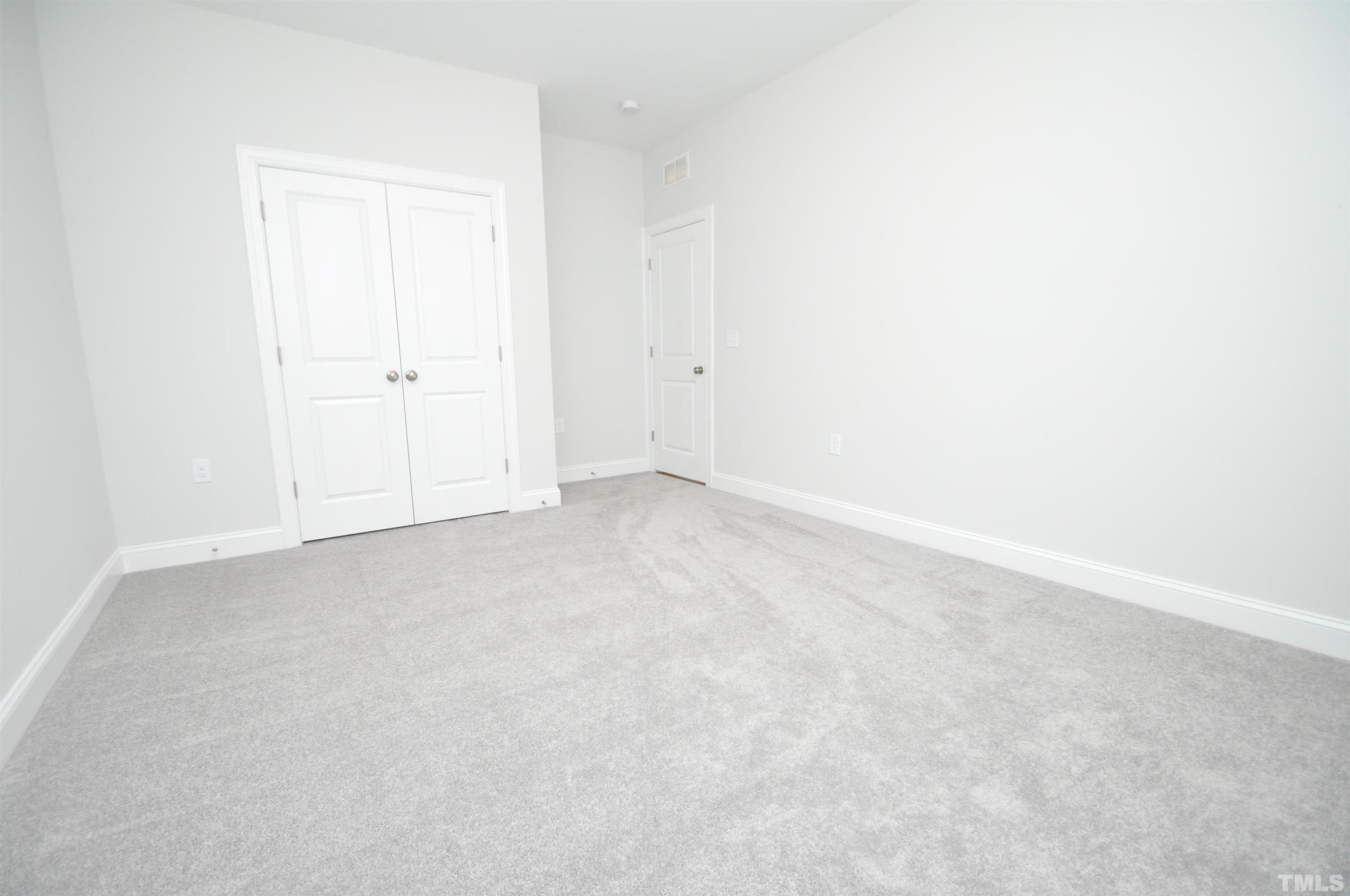 2949 Rise And Shine Road Apex, NC 27523 - Photo 20 of 49 a view of an empty room