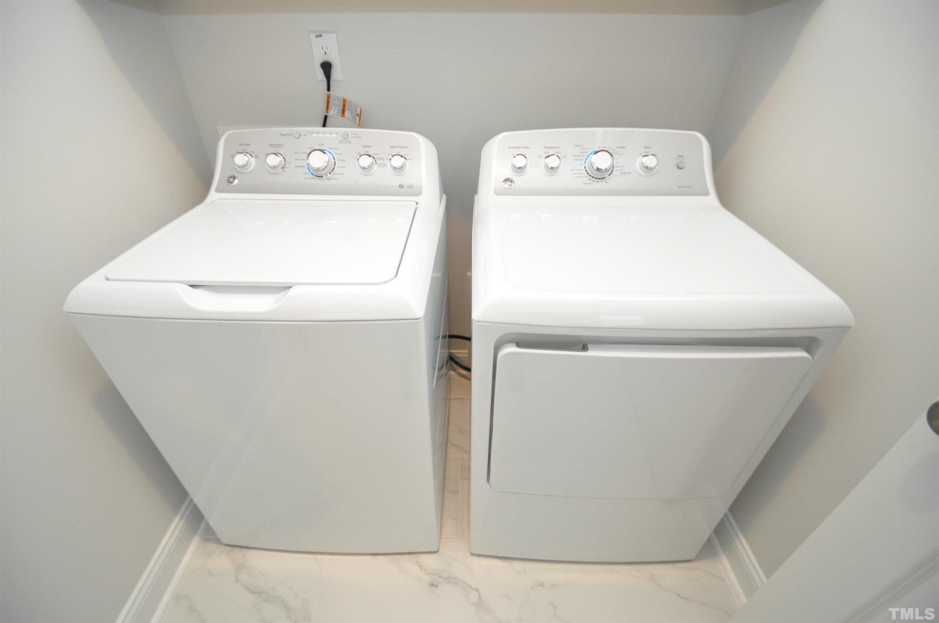 2949 Rise And Shine Road Apex, NC 27523 - Photo 24 of 49 a utility room with dryer and washer