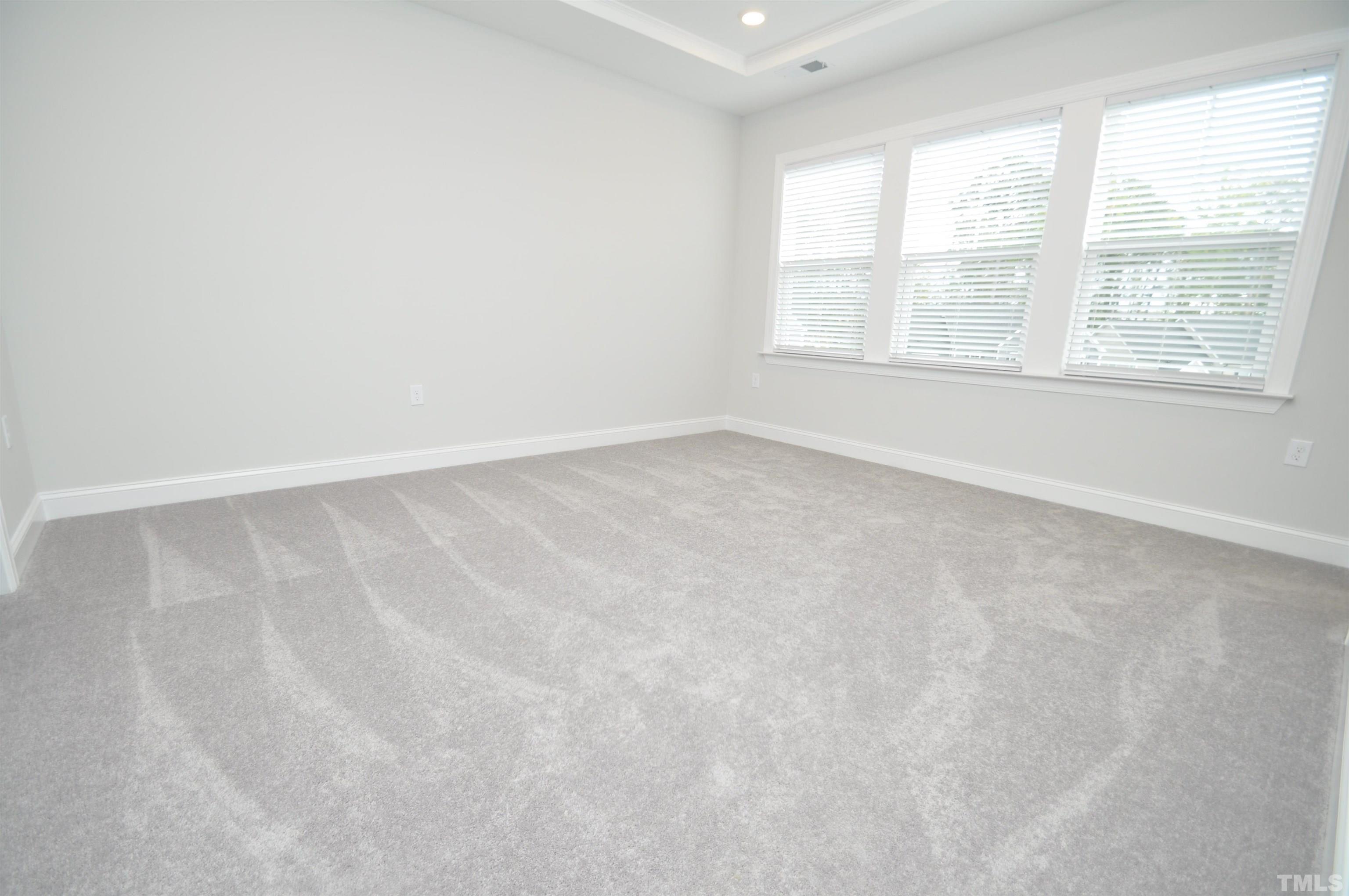2949 Rise And Shine Road Apex, NC 27523 - Photo 25 of 49 an empty room with a window