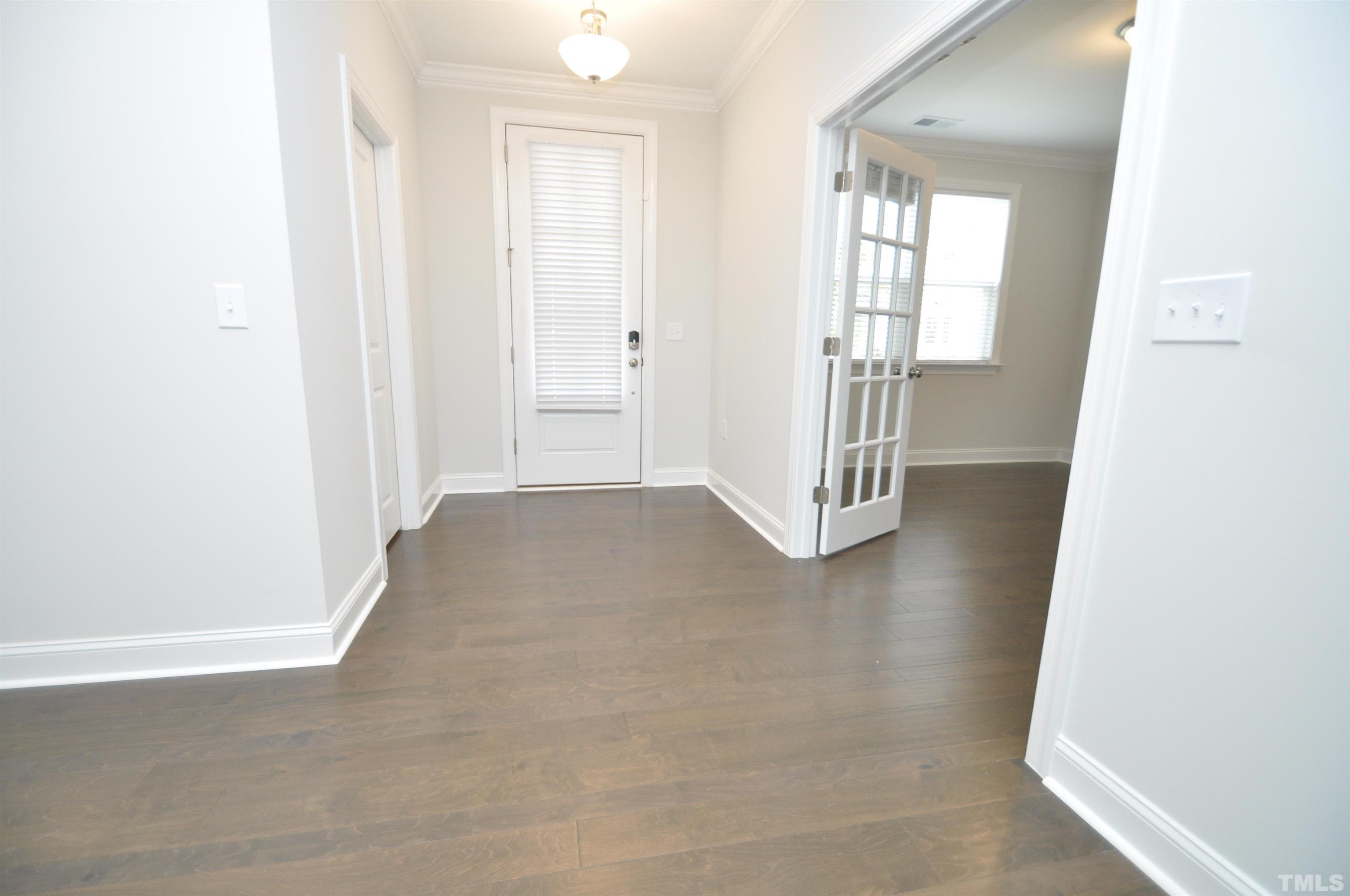 2949 Rise And Shine Road Apex, NC 27523 - Photo 3 of 49 an empty room with windows