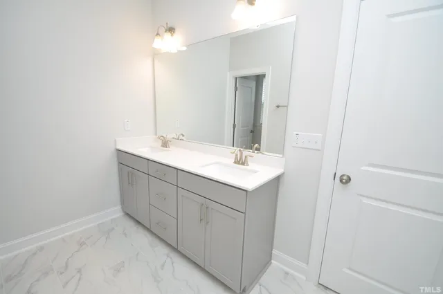 a view of a balcony with wooden floor