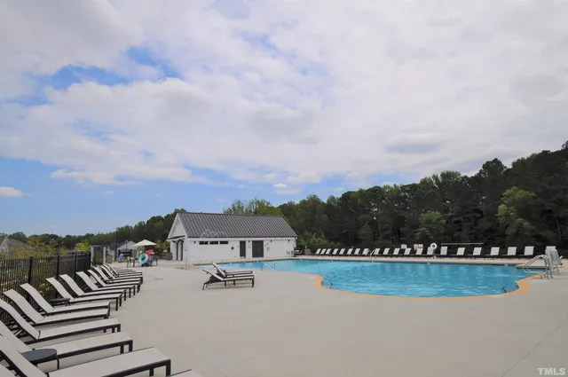 a view of living room filled with furniture and window