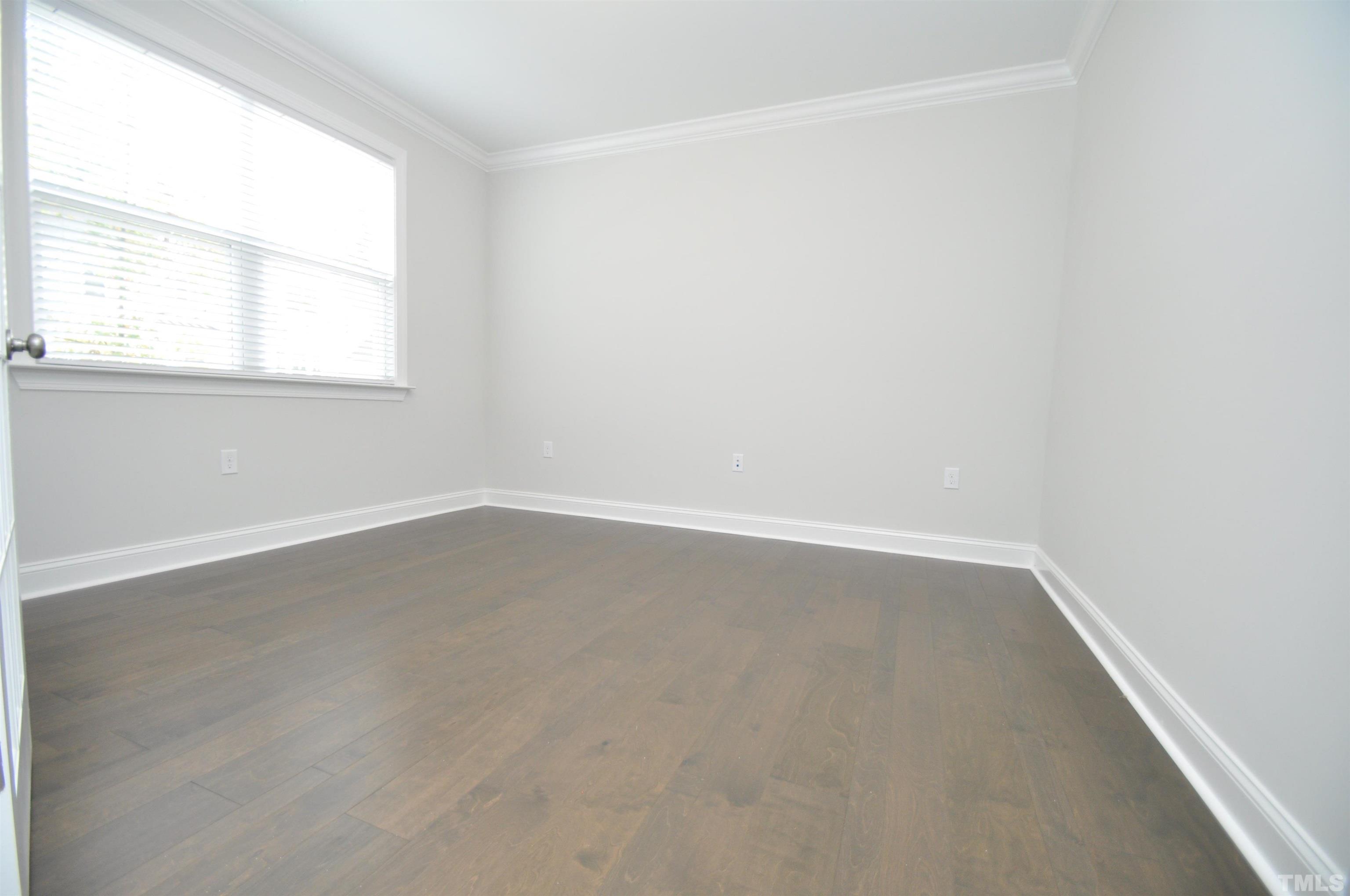 2949 Rise And Shine Road Apex, NC 27523 - Photo 5 of 49 an empty room with a window