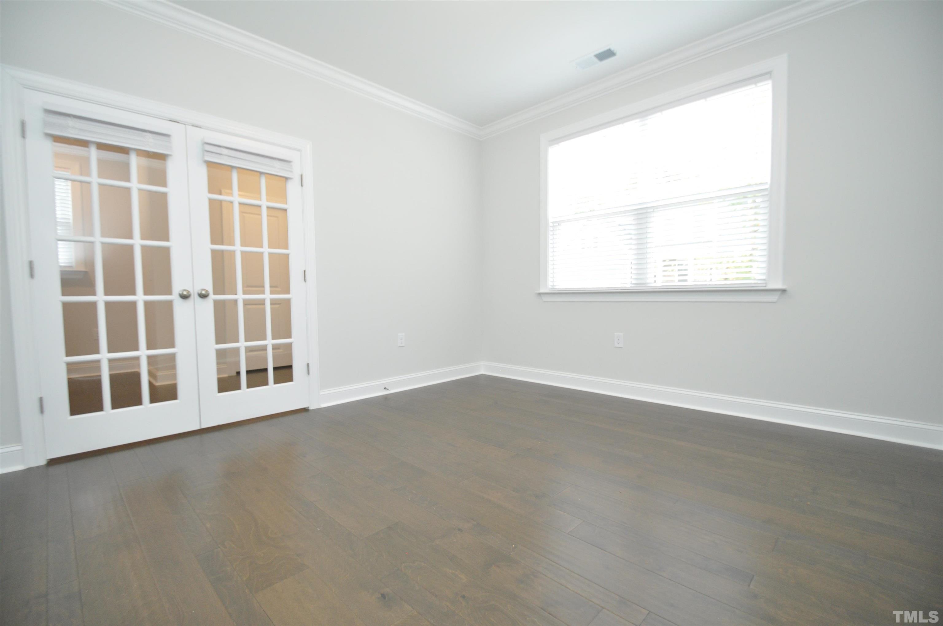 2949 Rise And Shine Road Apex, NC 27523 - Photo 6 of 49 an empty room with a window