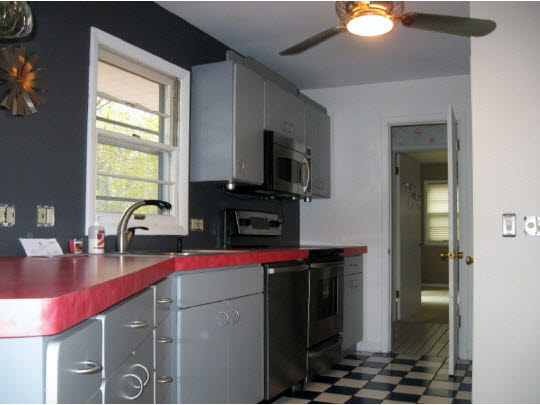 3215 North View Road Rockford, IL 61107 - Photo 6 of 11 a kitchen with stainless steel appliances a sink stove and refrigerator