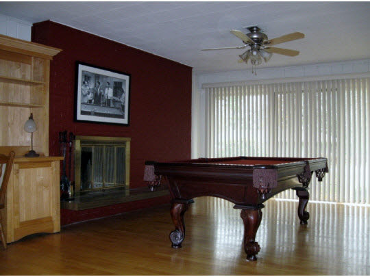 3215 North View Road Rockford, IL 61107 - Photo 8 of 11 a living room with furniture and a fireplace