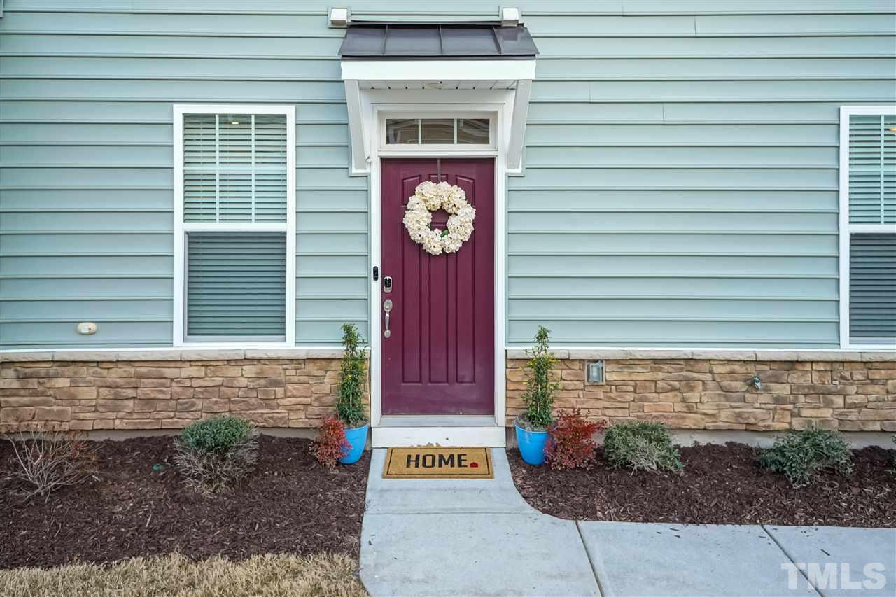 3 Moss Side Terrace Durham, NC 27703 - Photo 3 of 30 a front view of a house with a yard