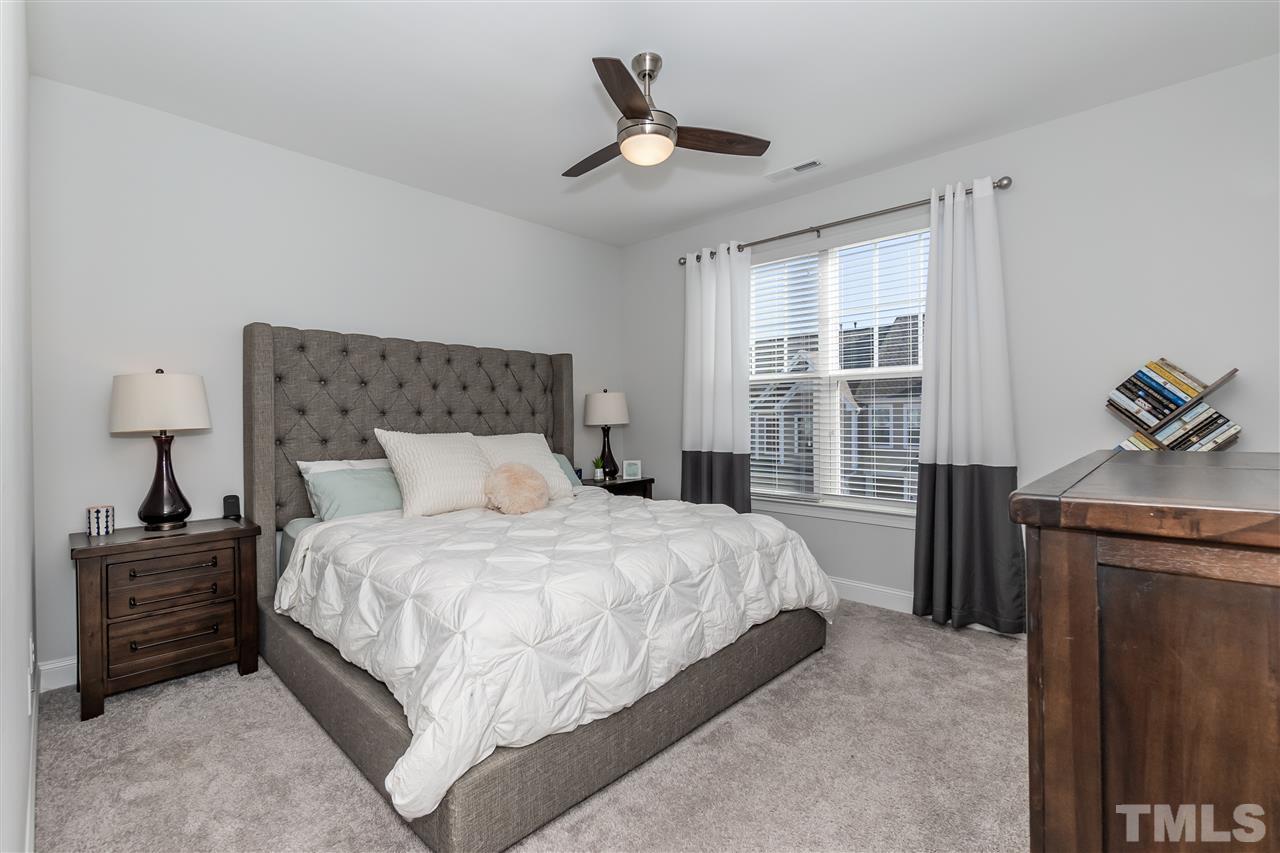 3 Moss Side Terrace Durham, NC 27703 - Photo 21 of 30 a bedroom with a bed and a window