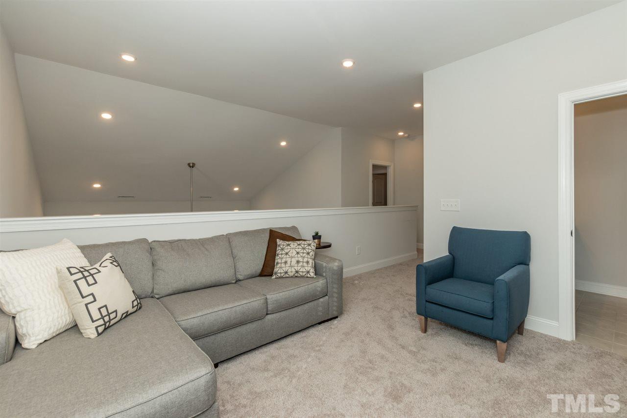 3 Moss Side Terrace Durham, NC 27703 - Photo 26 of 30 a living room with furniture and a couch