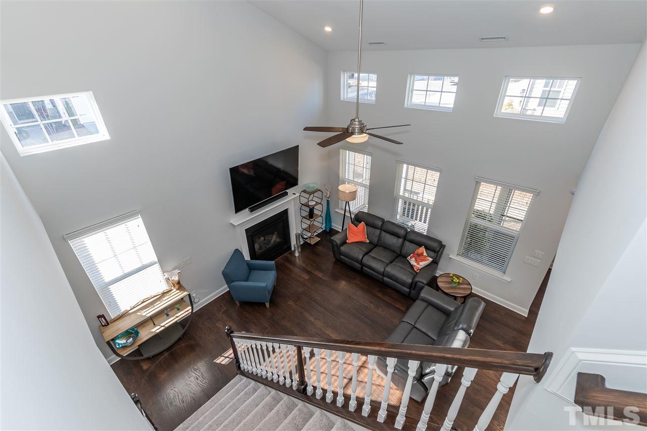 3 Moss Side Terrace Durham, NC 27703 - Photo 8 of 30 a living room with furniture and a flat screen tv