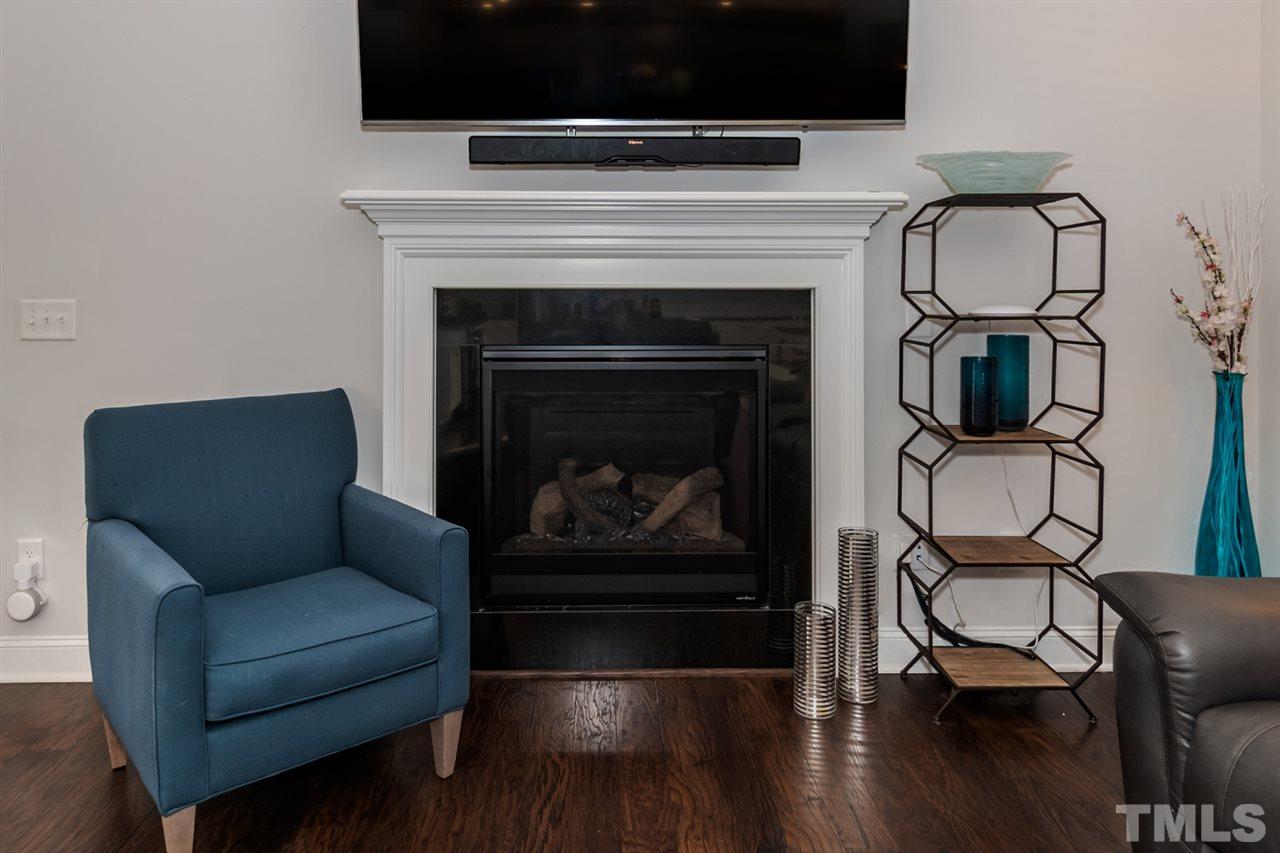 3 Moss Side Terrace Durham, NC 27703 - Photo 9 of 30 a living room with furniture and a fireplace