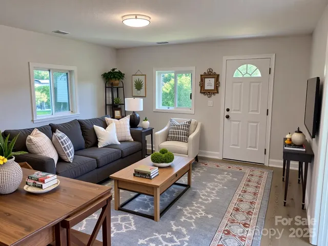 a view of a dining room with furniture and a window