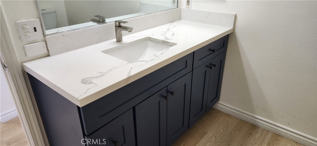 713 Walnut Drive Lake Elsinore, CA 92530 - Photo 23 of 28 a utility room with sink