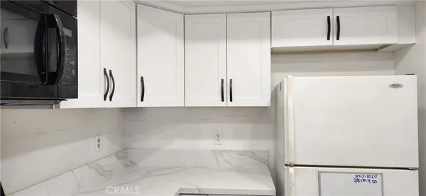 a bathroom with a bathtub and a sink