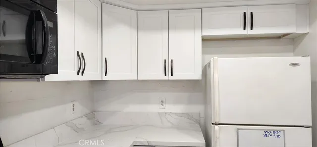 a bathroom with a bathtub and a sink