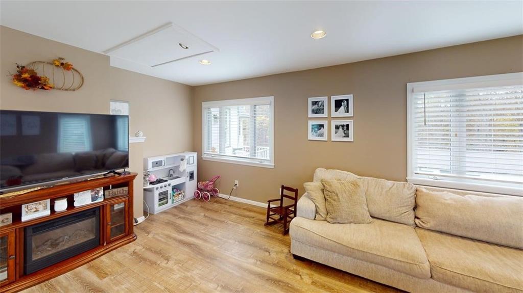 218 Myoma Road Mars, PA 16046 - Photo 14 of 35 a living room with furniture and a flat screen tv