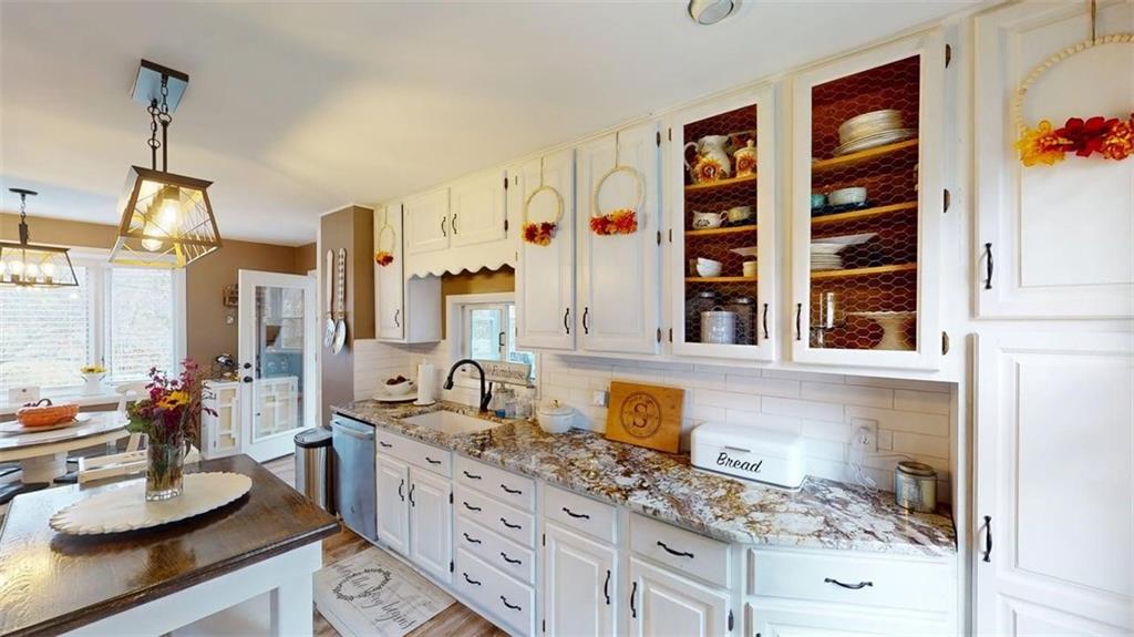 218 Myoma Road Mars, PA 16046 - Photo 17 of 35 a bathroom with a granite countertop sink mirror vanity and shower