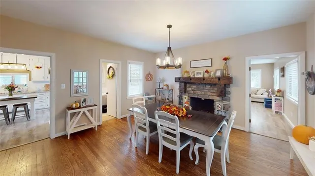 a view of a livingroom with furniture and a fireplace