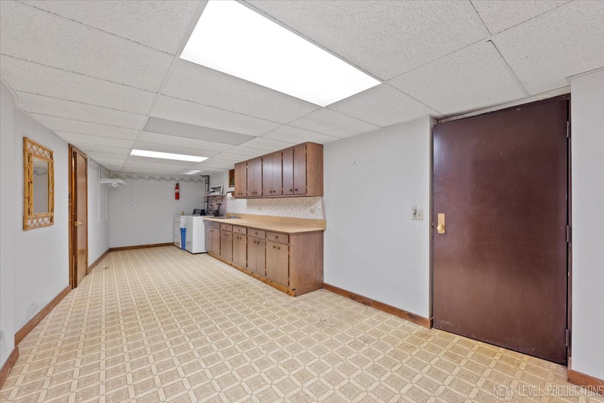 49W794 Lenschow Road Sycamore, IL 60178 - Photo 35 of 40 a view of a kitchen with furniture and a window