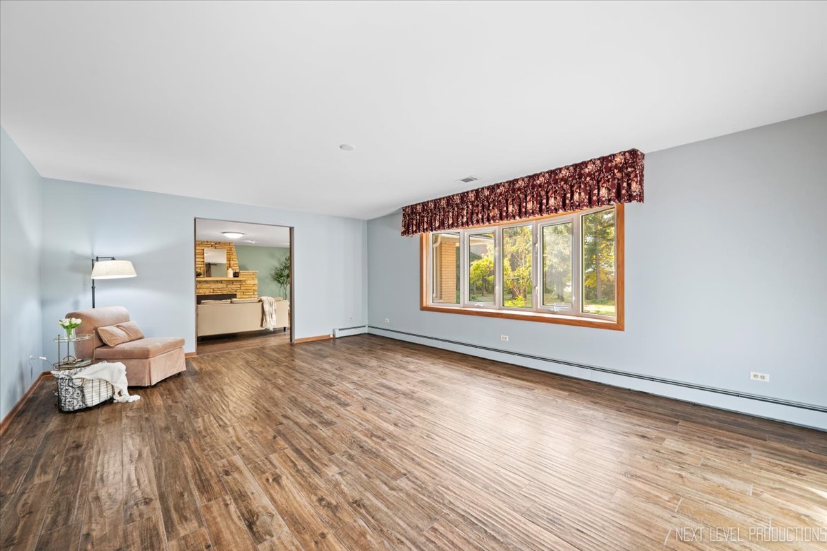 49W794 Lenschow Road Sycamore, IL 60178 - Photo 5 of 40 a view of an empty room and window