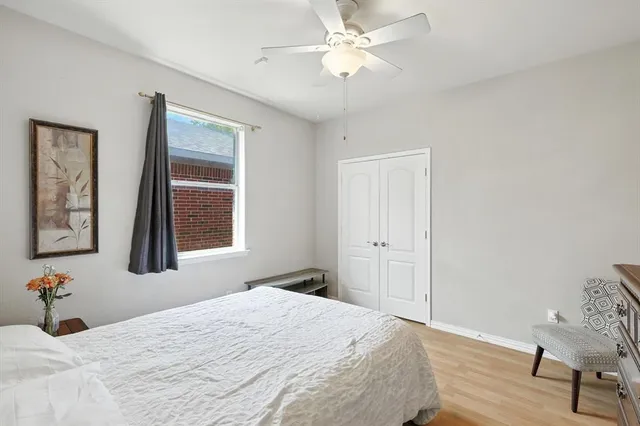 a bathroom with a toilet a sink and a mirror